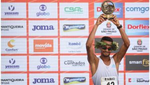 Fabio Jesus celebrates as he finished fourth in the men's race at the annual "Sao Silvestre Run", an international race through the streets of Sao Paulo, Brazil December 31, 2022. REUTERS/Carla Carniel